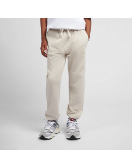 Детские брюки New Balance LAKB0060TWF - бежевые