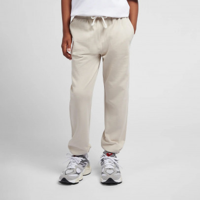 Детские брюки New Balance LAKB0060TWF - бежевые