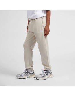 Детские брюки New Balance LAKB0060TWF - бежевые