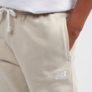 Детские брюки New Balance LAKB0060TWF - бежевые