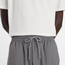 Мужские брюки New Balance MB61R010CAS - серые