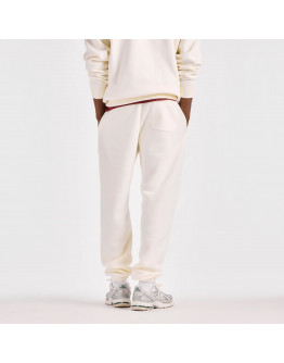 Мужские брюки New Balance Reimagined Graphic MB62S1NTAGA - бежевые