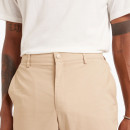 Мужские брюки New Balance MP43554SOT - бежевые