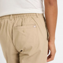 Брюки New Balance MP43560SOT - бежевые