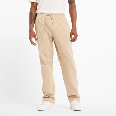 Брюки New Balance MP44587SNW - бежевые