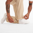 Брюки New Balance MP44587SNW - бежевые