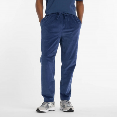 Мужские брюки New Balance MP53521NNY - темно-синие