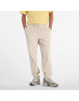 Мужские брюки New Balance MP53521TWF - бежевые