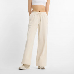 Женские брюки New Balance WP51503LIN - бежевые