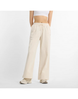 Женские брюки New Balance WP51503LIN - бежевые