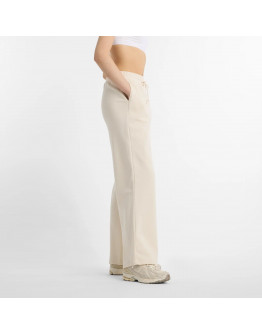 Женские брюки New Balance WP51503LIN - бежевые