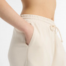 Женские брюки New Balance WP51503LIN - бежевые