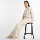 Женские брюки New Balance WP51503LIN - бежевые