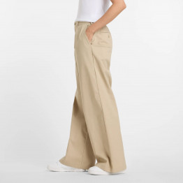 Женские брюки New Balance WP51538SOT - бежевые