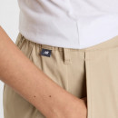 Женские брюки New Balance WP51538SOT - бежевые