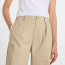 Женские брюки New Balance WP51538SOT - бежевые