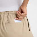 Женские брюки New Balance WP51538SOT - бежевые