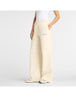 Женские брюки New Balance WP53903LIN - бежевые