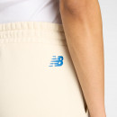 Женские брюки New Balance WP53903LIN - бежевые